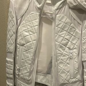 White leather jacket  with zipper and quilted treatment front and backk